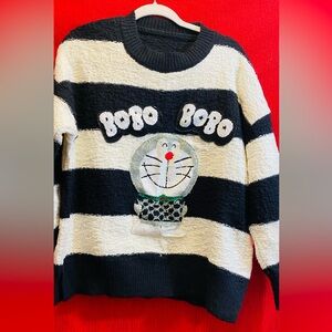 Striped Black and White Sweater with Cartoon Design